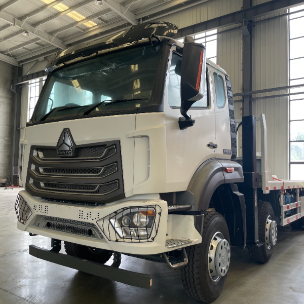 重汽豪瀚NX 8×4平板车 白色371马力 曼技术车桥 四点悬浮驾驶室 液压爬梯可选
